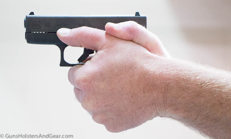 This photo shows the author shooting the Glock 43 during his testing for this pistol review. A good gun review includes hands-on time to ensure the semi-automatic pistol is reliable.