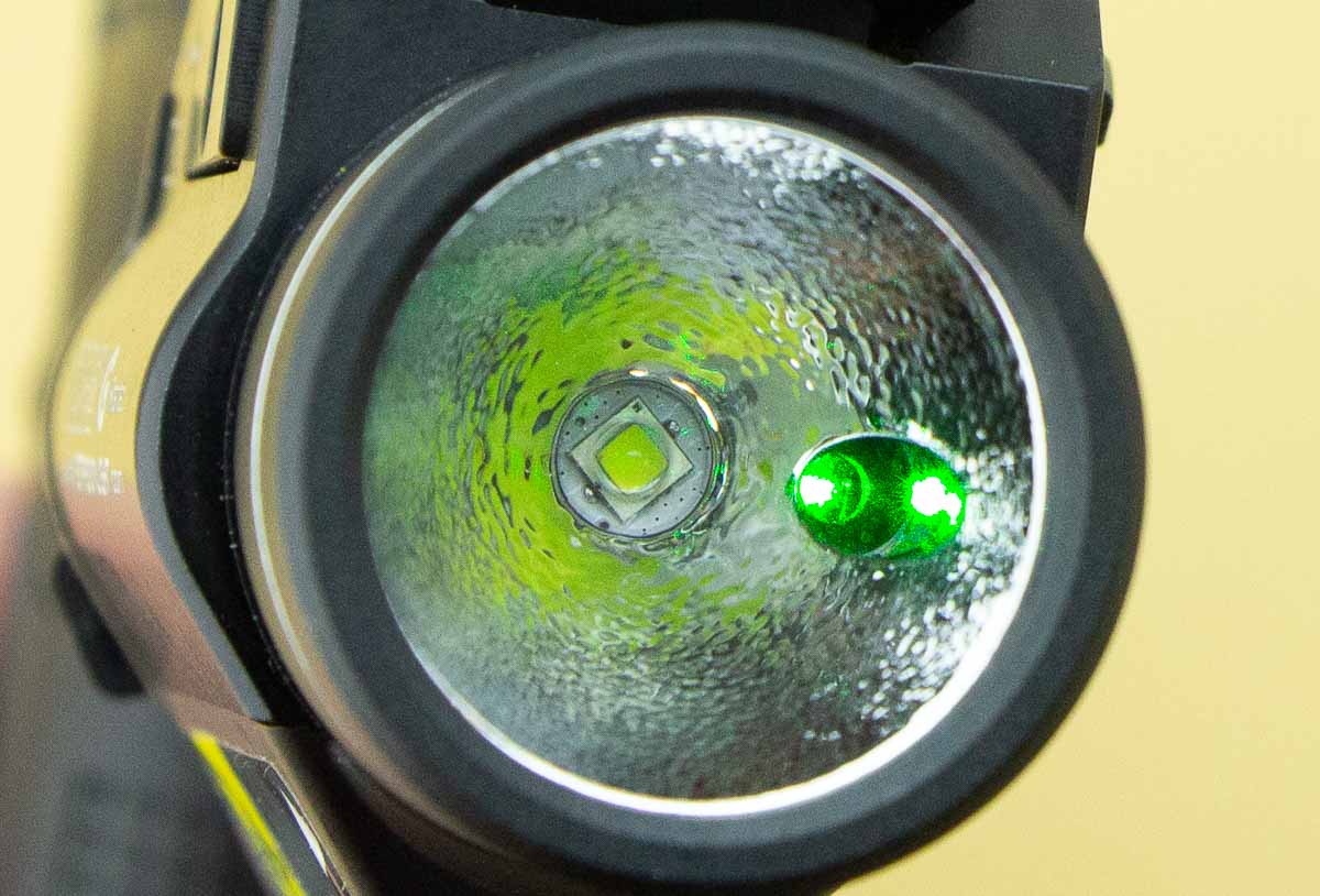 green laser emitter next to the light LED