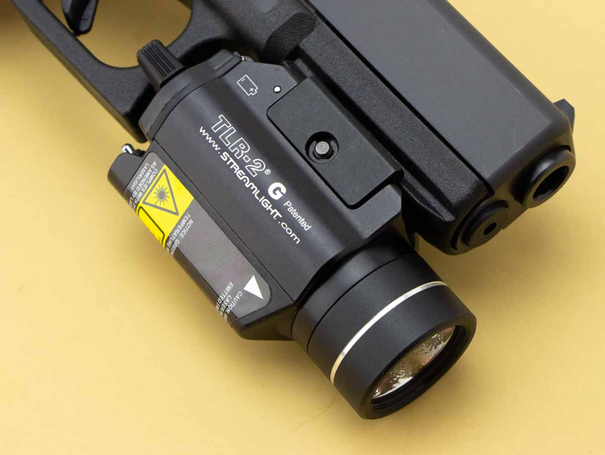 how far does the TLR-2 stick out past the muzzle