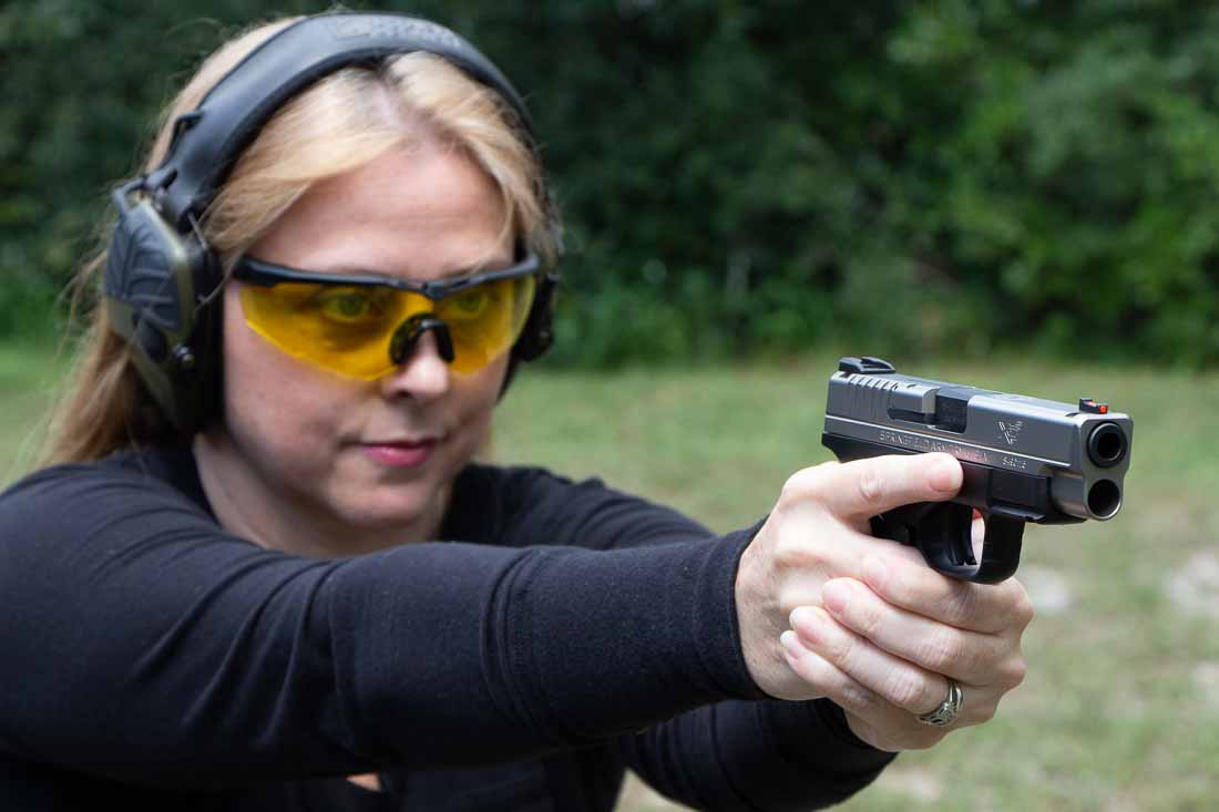 Beautiful woman shooting the XDS 4.0