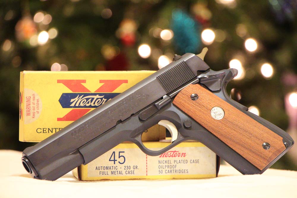 The image shows Black Friday gun deals. The photograph highlights a retail display featuring Black Friday gun deals. The scene presents sale tags advertising Black Friday gun deals. The signage emphasizes discounted prices tied to Black Friday gun deals. The shoppers observe the promotional setup for Black Friday gun deals. The store environment frames a commercial context for Black Friday gun deals. The marketing materials associate seasonal shopping with Black Friday gun deals. The overall composition illustrates a consumer focus on Black Friday gun deals.