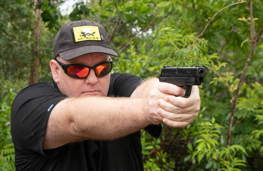 author shooting the Springfield XD-E handgun