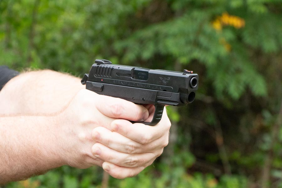 author testing the XD-E on the shooting range