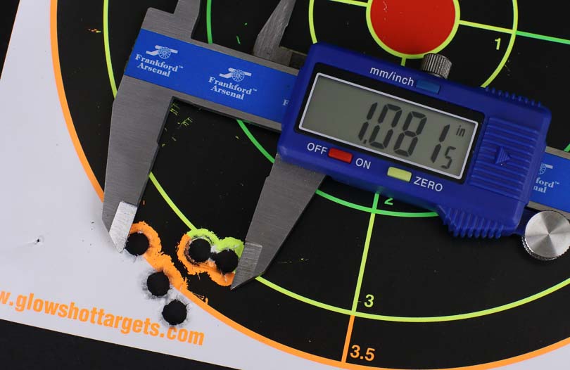 A paper target displays bullet groupings from accuracy testing with the Kalashnikov KR-9 rifle at measured distances. The Kalashnikov KR-9 delivers consistent accuracy for defensive purposes. Pistol caliber carbines achieve tight groupings at common distances. The KUSA 9mm pistol caliber carbine maintains excellent precision under testing. Semi-automatic firearms demonstrate repeatable shot placement capabilities. AK-pattern carbines provide adequate accuracy for tactical applications.