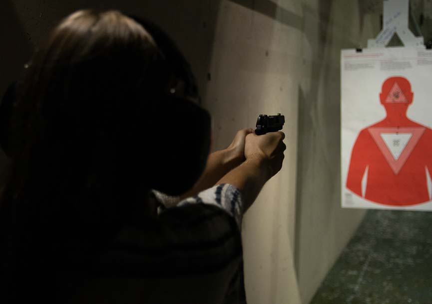 The compact Springfield 911 is fired at paper targets downrange, capturing muzzle flash and the shooter's stance during accuracy evaluation sessions. This Springfield 911 9mm review documents real-world shooting performance with carry ammunition. Firearms testing protocols verify function with lightweight and heavy bullet weights. The Springfield Armory 911 handles +P defensive loads without mechanical issues. Small pistols require shooter proficiency to maximize their defensive potential. Live-fire testing separates reliable carry guns from unreliable alternatives.