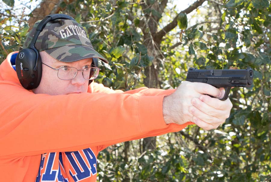 author shooting the Smith and Wesson pistol