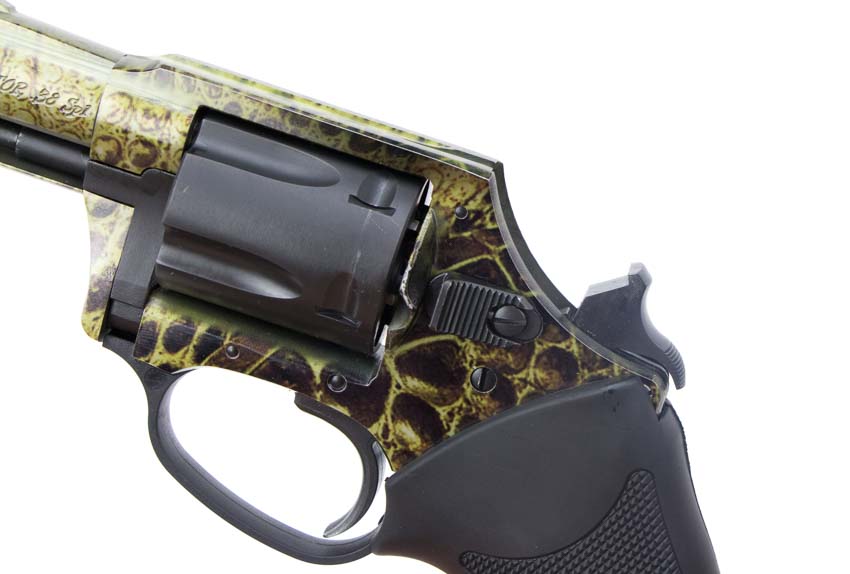 Charter Arms Undercover hammer pulled back in single action mode